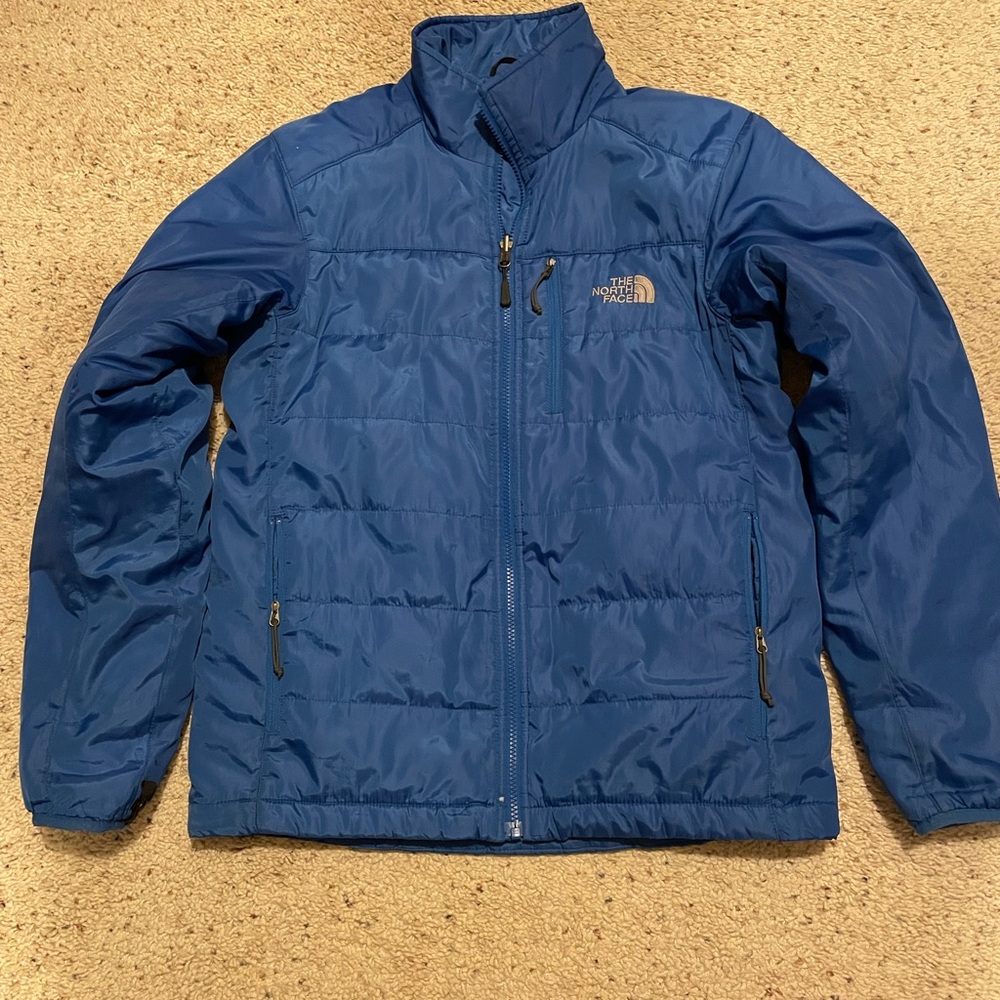 The North Face Blue Puffer Jacket with Quilted Design